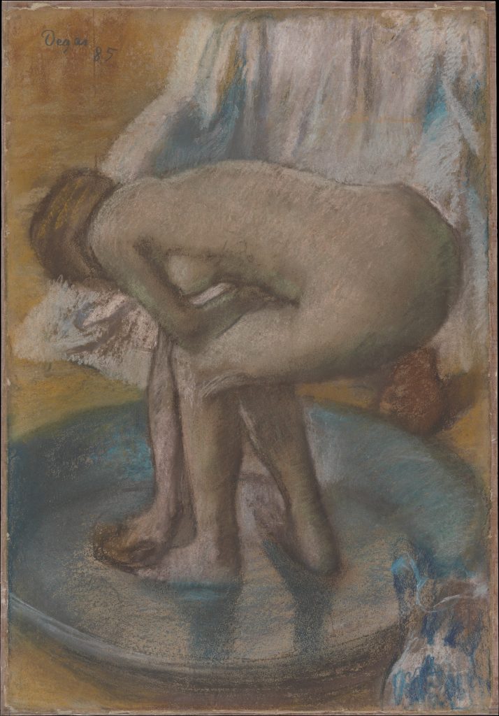 Edgar Degas. Woman Bathing in a Shallow Tub. A woman bathes in a shallow metal tub. She bends over to wash her left foot. She is seen in three-quarter-view from the back